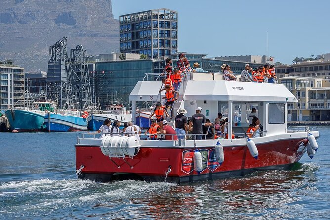 30min Harbour Boat Cruise Cape Town - Boarding Une Belle Vie for the harbour loop
