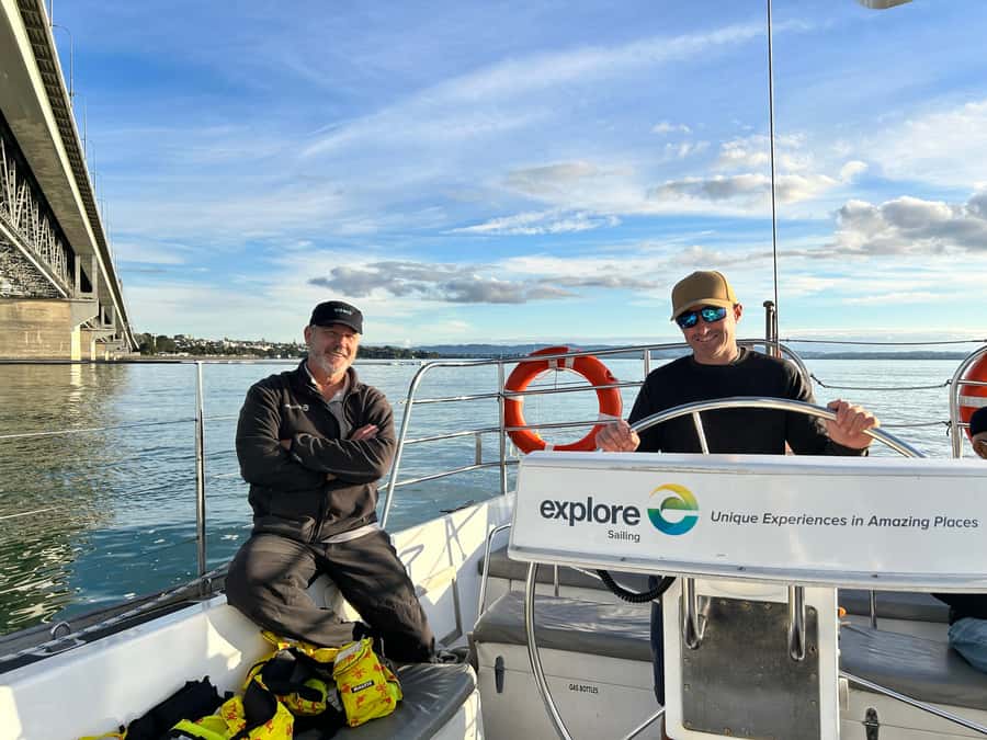 Auckland Harbour 1.5-Hour Sailing Cruise - Taking the helm and helping with the sails