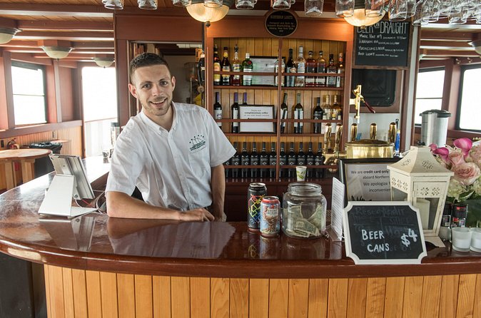 Boston Harbor Night Cruise - Open-air seats, cabin comfort, and wet decks