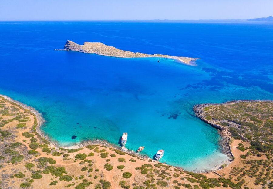 Crete: Mirabello Bay Cruise with Onboard Cocktail - Shade and seating can shape your day