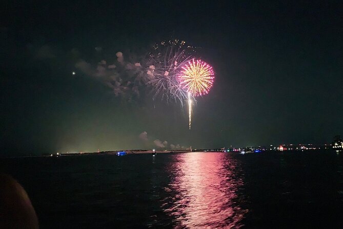 Destin Harbor Fireworks Cruise - Cruising toward Emerald Grande and HarborWalk Village