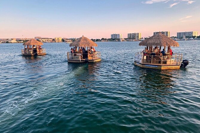 Destin's Floating Tiki Bar Cruise: 360° Harbor Views - Cruising past boats, homes, and harbor inlets