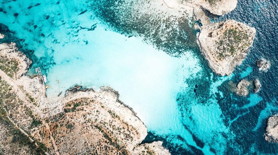 From Mellieha: Three Bay Cruise including the Blue Lagoon - Blue Lagoon: beautiful water, crowded shore