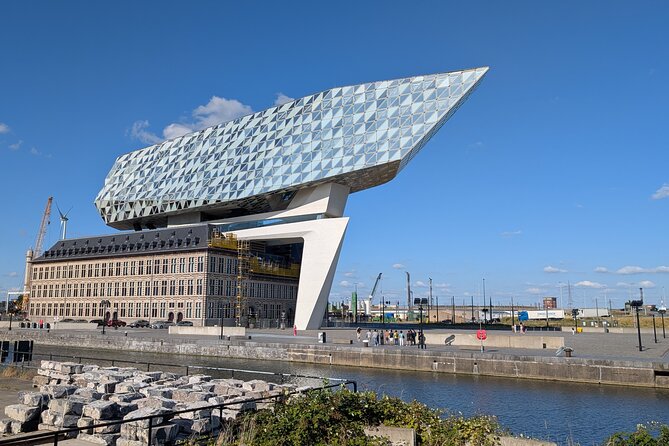 Guided Antwerp Port Tour, in your Car or Minibus - Oosterweel, where a church meets a huge construction site
