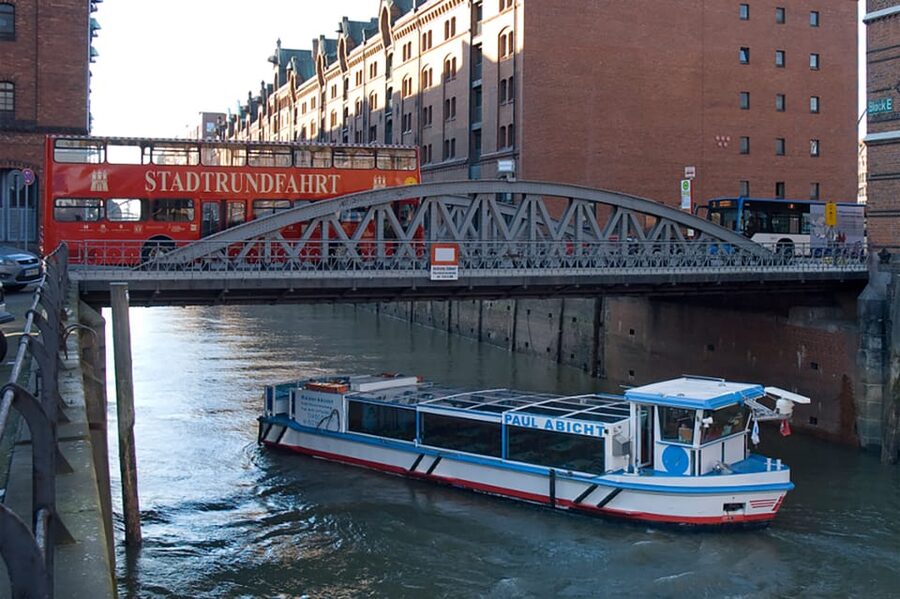 Hamburg: Harbor Cruise and Bus City Hop-On Hop-Off Tour - The harbor cruise through Speicherstadt