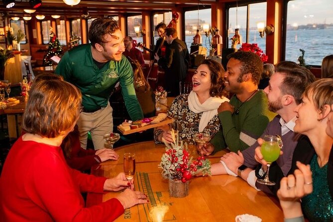 Holiday Sunset Cruise in Boston Harbor - Cabin comfort, top-deck views, and the onboard bar