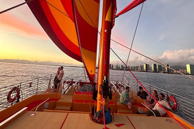 Honolulu Sunset Sail from Kewalo Harbor Including Drinks - A sunset sail with a social Honolulu feel