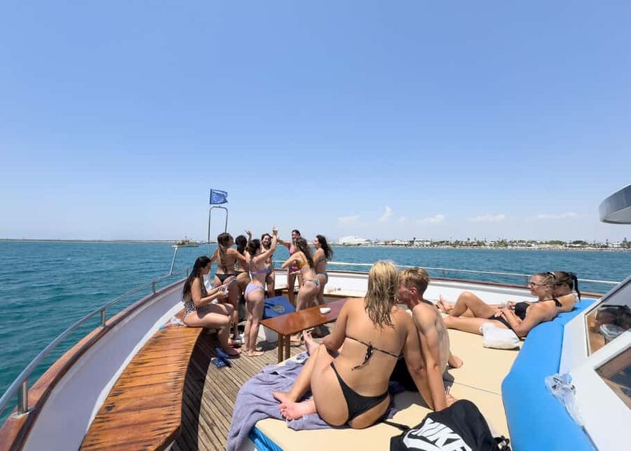 Larnaca Bay Cruise with Snorkeling - Mackenzie Beach and the planes overhead