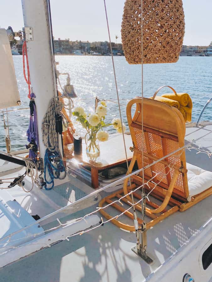 Newport Beach: The Boat People Cruise-Private Harbor Cruises - A small sailboat changes the Newport Beach view