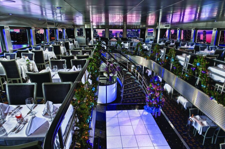 NYC: Christmas Eve Buffet Lunch or Dinner Harbor Cruise - Crossing toward Lower Manhattan and the bridges