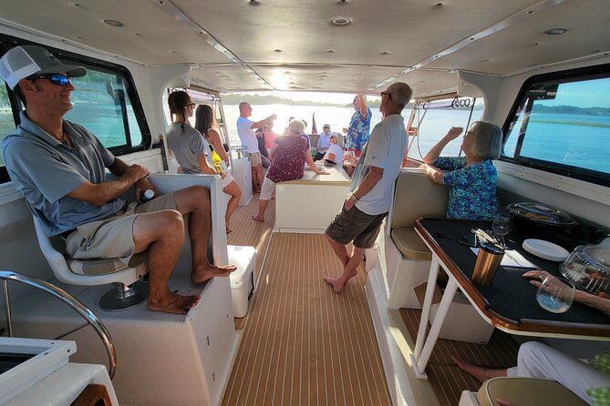 Private Sunset Harbor Tour 20 passenger party Yacht Kismet - Dolphins and the Lowcountry water view