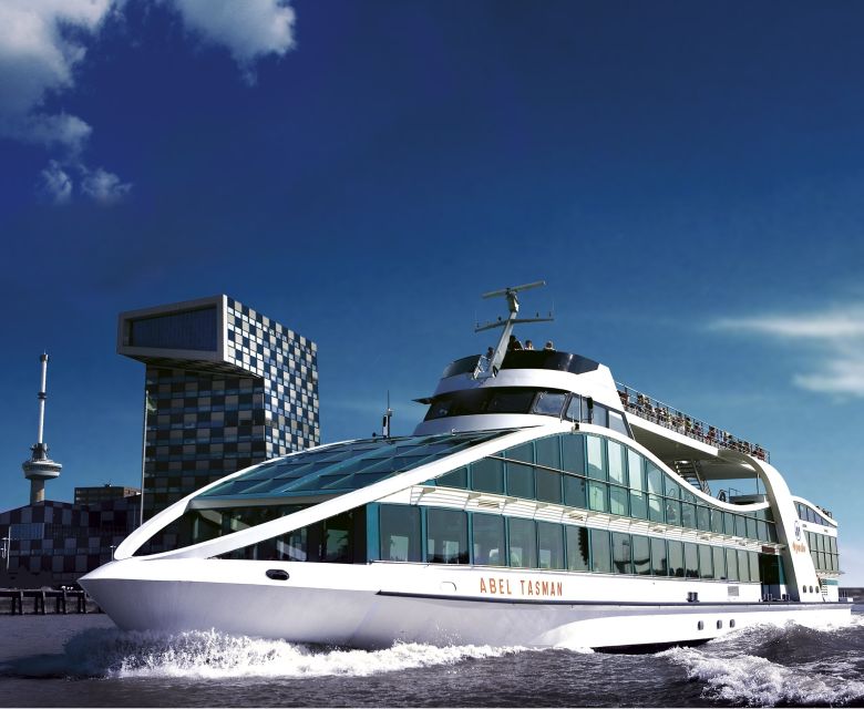 Rotterdam Walking Tour and Harbor Cruise - Market Hall brings food and housing under one roof