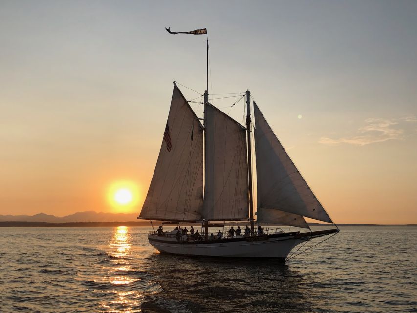 Seattle: Tall Sailboat Sunset Harbor Cruise - Raising the sails on the Bay Lady