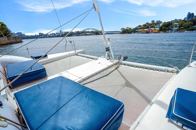 Sydney: Harbour Highlights & Aussie Bites Catamaran Cruise - Passing beneath the Harbour Bridge